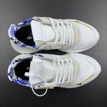 Cargar imagen en el visor de la galería, Adidas Nite Jogger White Grey Blue Gold FW6709