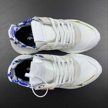 Cargar imagen en el visor de la galería, Adidas Nite Jogger White Grey Blue Gold FW6709
